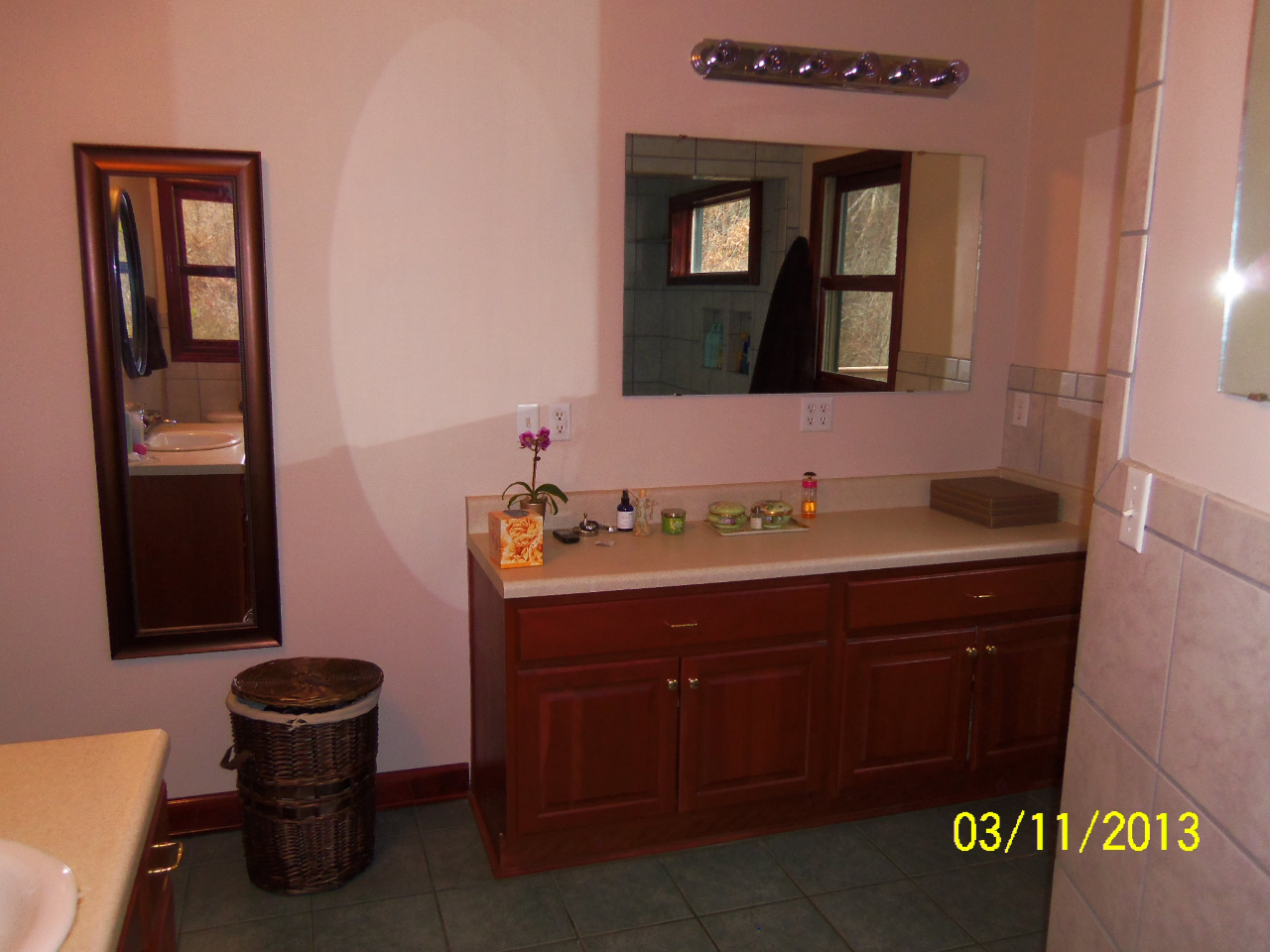 3210 Seneca Hollow Road Elliston, VA 24087 - Photo 21 of 40 a bathroom with a sink and a mirror