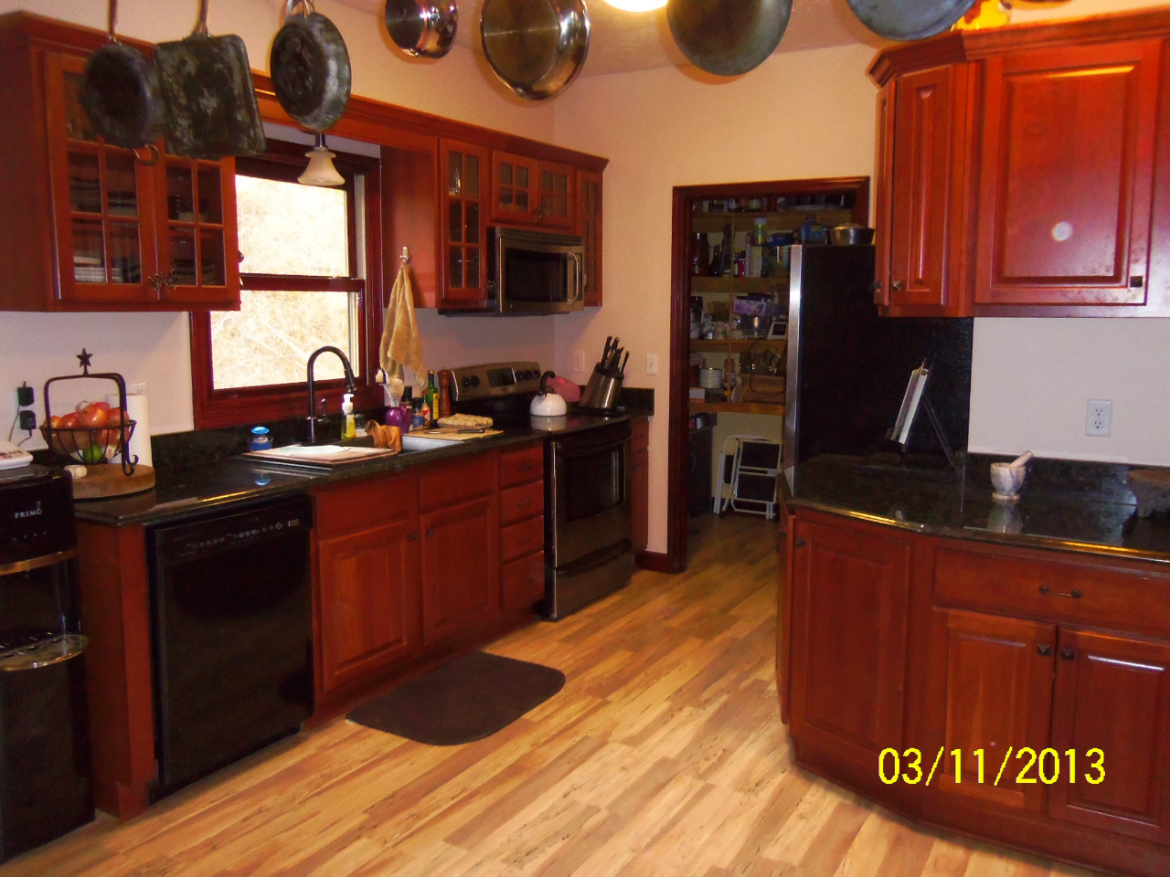 3210 Seneca Hollow Road Elliston, VA 24087 - Photo 10 of 40 a kitchen with stainless steel appliances granite countertop a stove a sink dishwasher and a microwave oven with cabinets