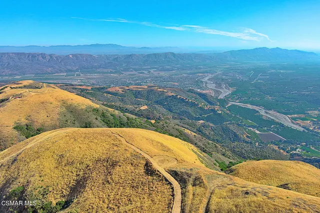 a view of swimming pool from a lake