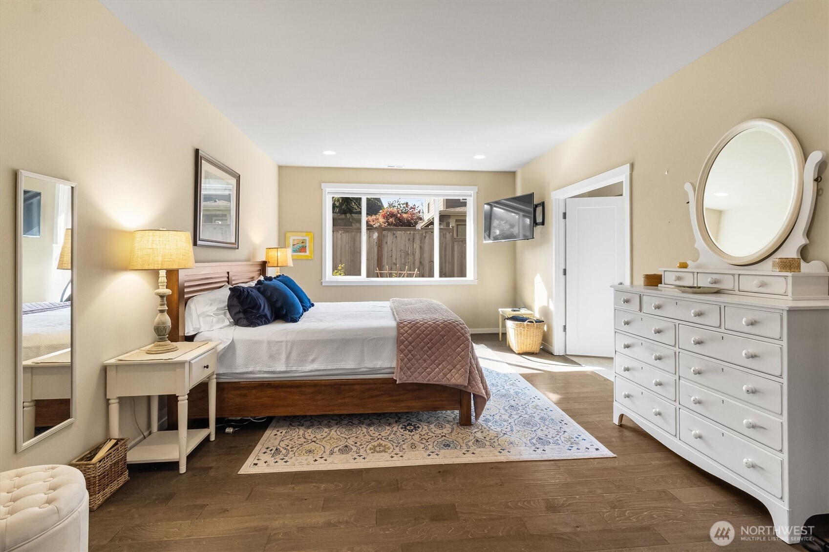 2712 Coho Lane Anacortes, WA 98221 - Photo 13 of 34 a living room with furniture a large window and a table