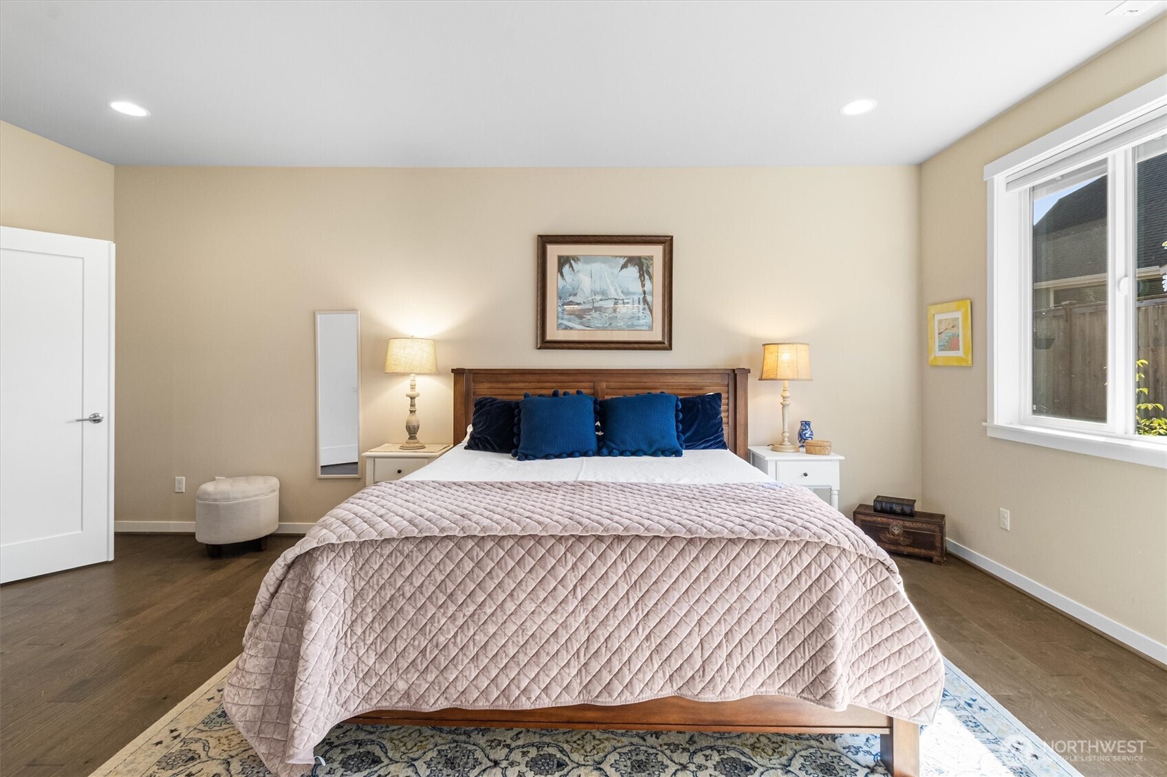 2712 Coho Lane Anacortes, WA 98221 - Photo 14 of 34 a bedroom with a bed and wooden floor