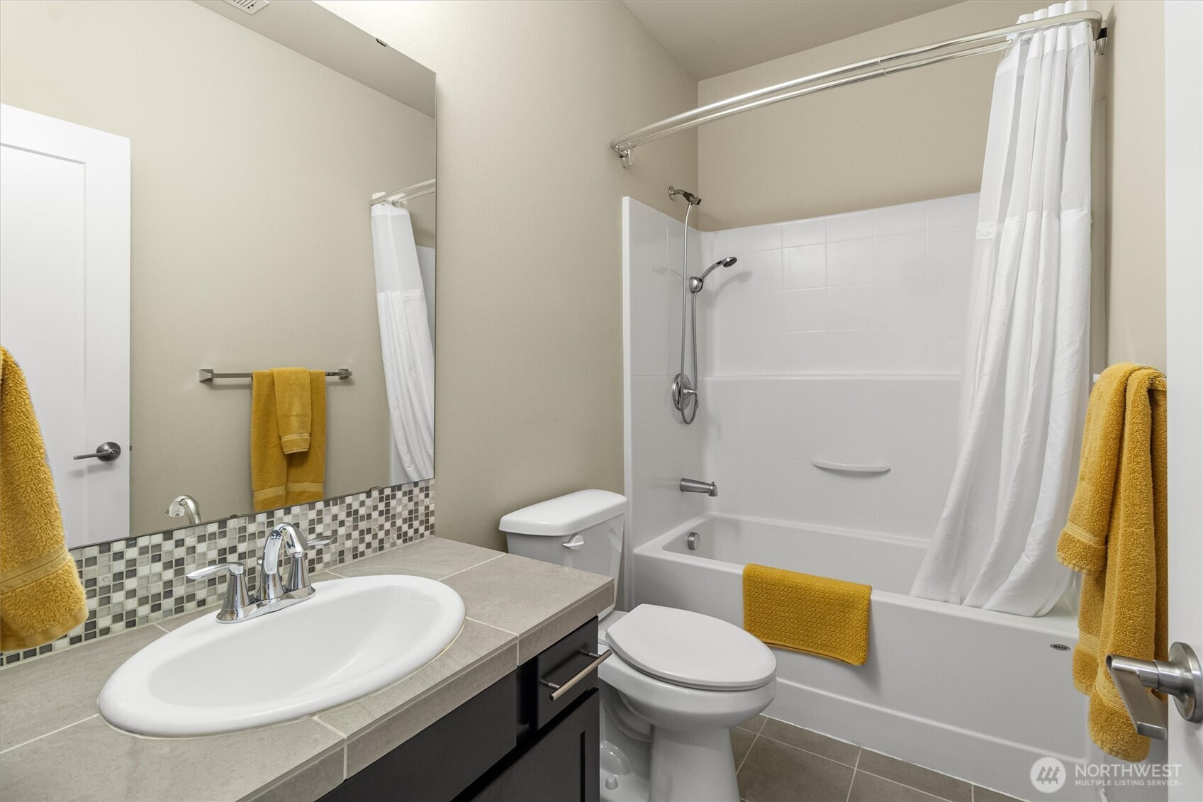 2712 Coho Lane Anacortes, WA 98221 - Photo 19 of 34 a bathroom with a sink mirror vanity and toilet