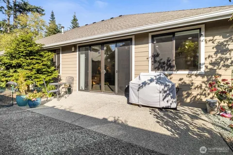 a view of a lounge chair in front of the house