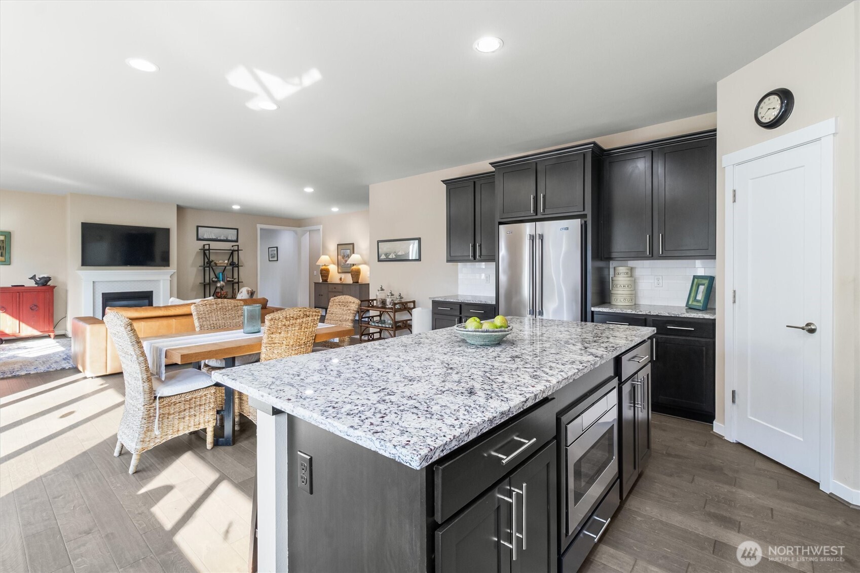 2712 Coho Lane Anacortes, WA 98221 - Photo 4 of 34 a kitchen with stainless steel appliances granite countertop wooden cabinets a refrigerator and a stove