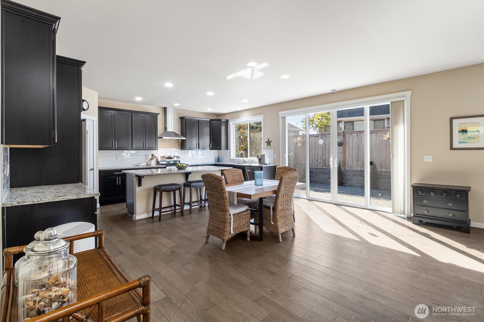 2712 Coho Lane Anacortes, WA 98221 - Photo 6 of 34 a living room with stainless steel appliances kitchen island granite countertop furniture and a fireplace