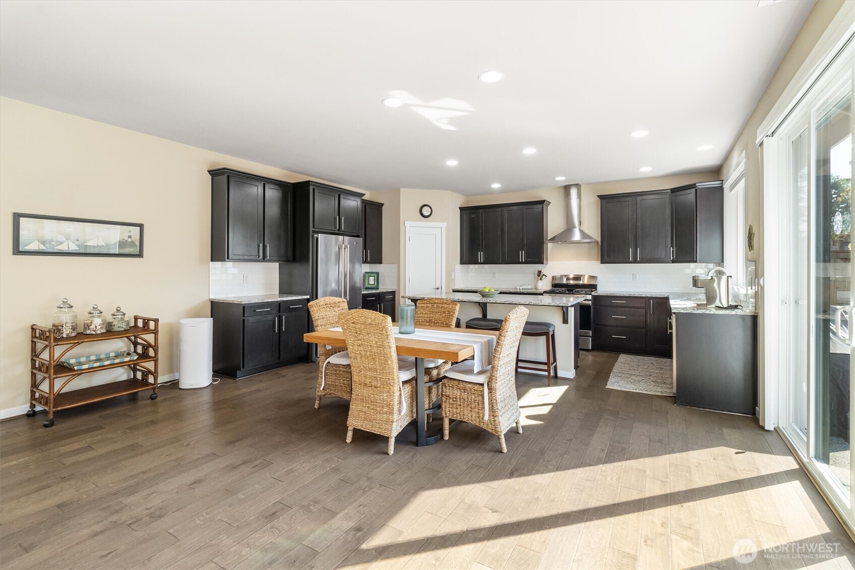 2712 Coho Lane Anacortes, WA 98221 - Photo 7 of 34 a living room with furniture and a flat screen tv