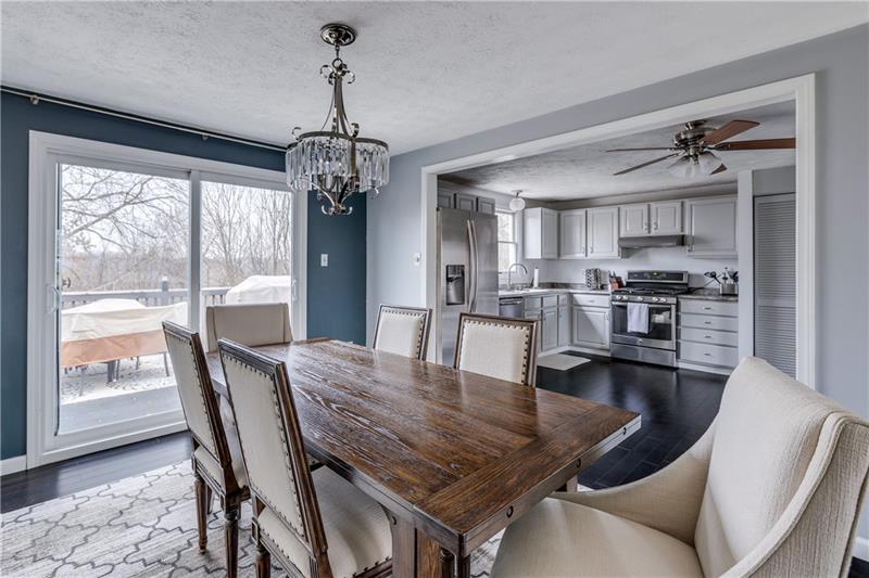 319 Ritter Road South Sewickley, PA 15143 - Photo 5 of 23 The spacious dining room opens through the extra-wide doorway to the kitchen. Beautiful trim-work and moldings accent the tasteful attention to detail in this updated space.