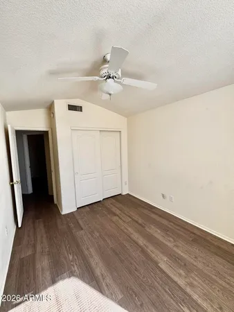 a view of a livingroom with wooden floor