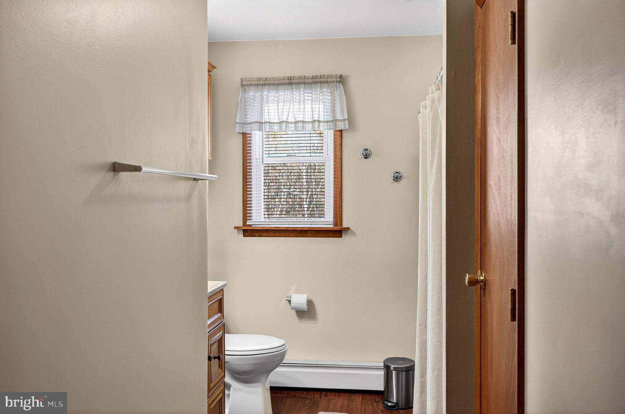 854 Lily Lake Road Wapwallopen, PA 18660 - Photo 17 of 36 Bright and inviting bathroom with natural light.