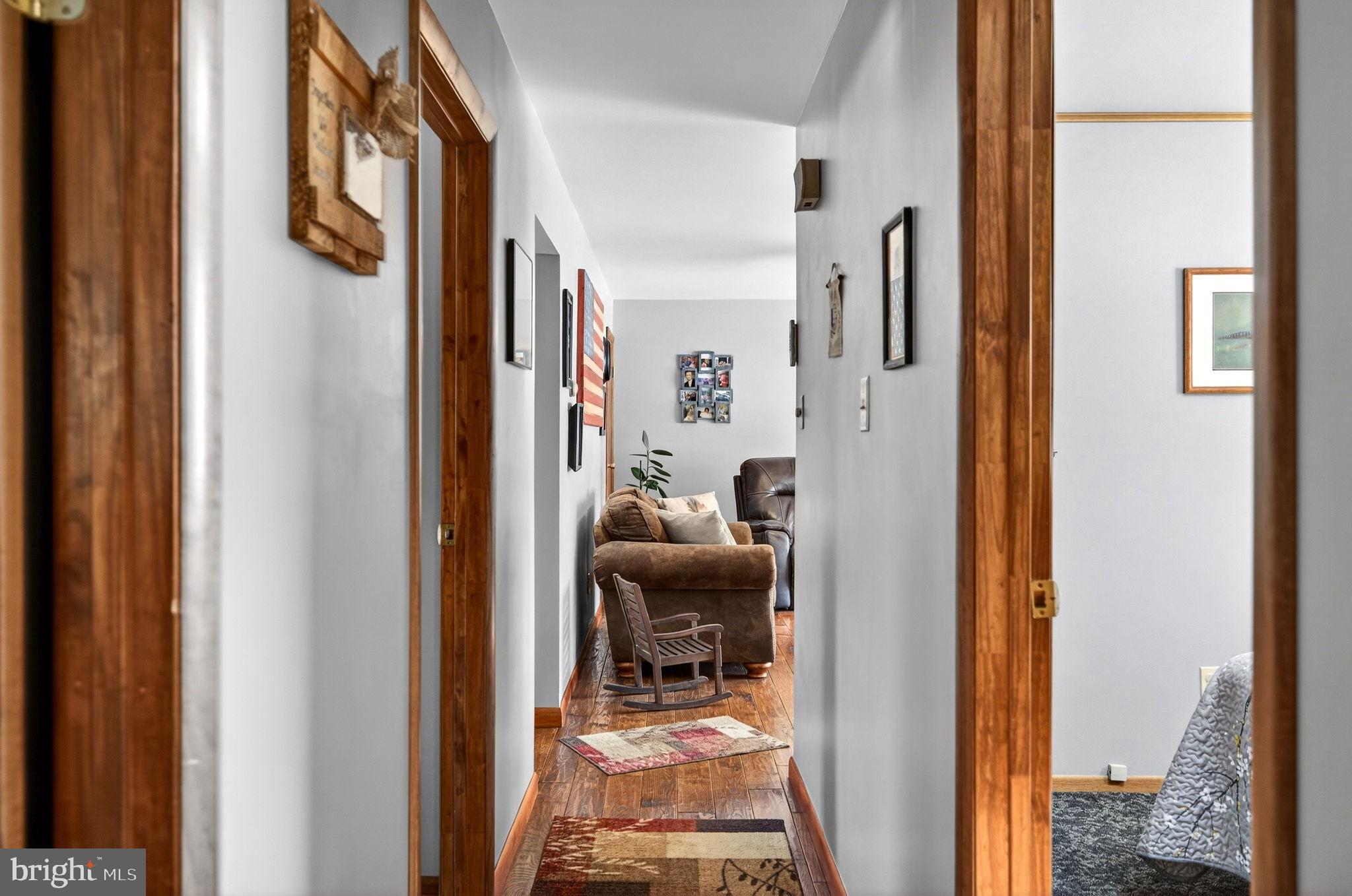 854 Lily Lake Road Wapwallopen, PA 18660 - Photo 18 of 36 Inviting hallway with warm wooden accents.