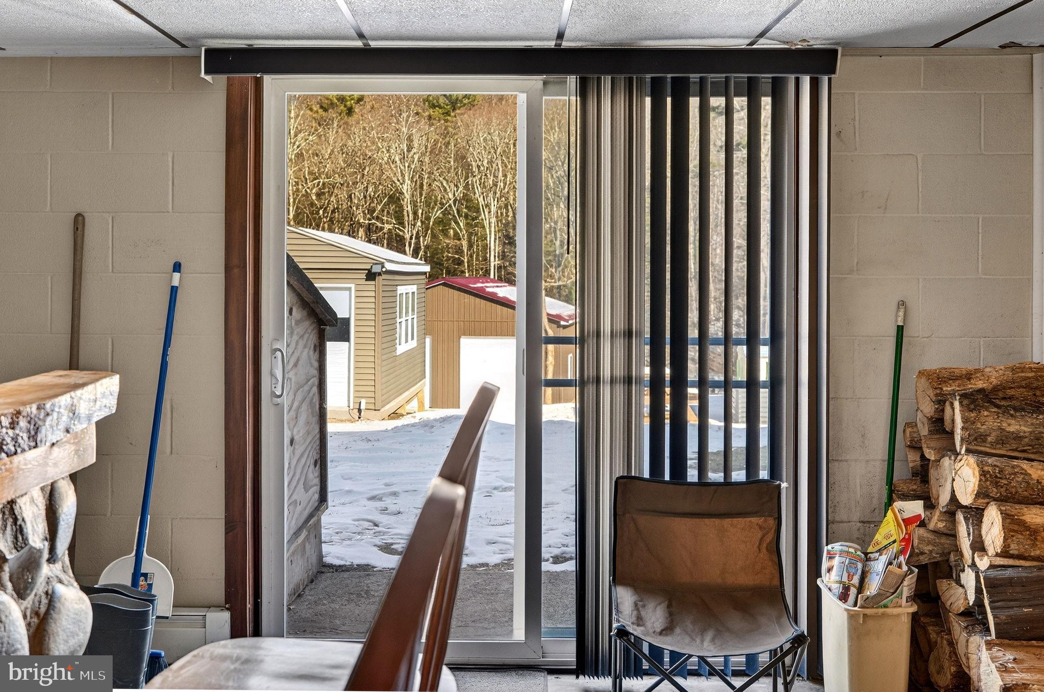 854 Lily Lake Road Wapwallopen, PA 18660 - Photo 25 of 36 Inviting entryway to a serene outdoor view.