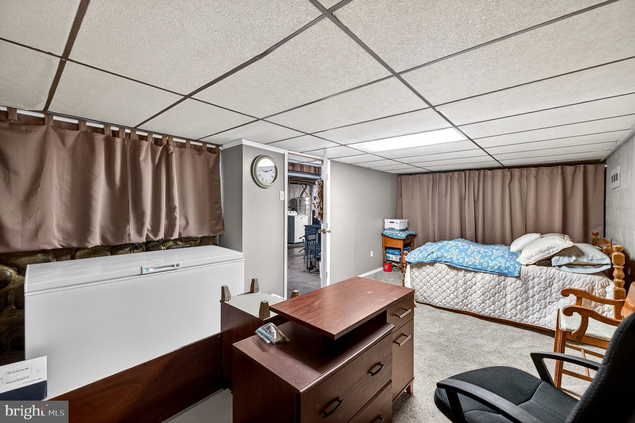 854 Lily Lake Road Wapwallopen, PA 18660 - Photo 26 of 36 Cozy basement retreat with versatile space.