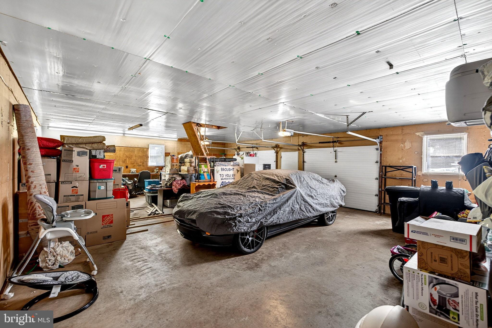 854 Lily Lake Road Wapwallopen, PA 18660 - Photo 30 of 36 Spacious garage with ample storage potential.