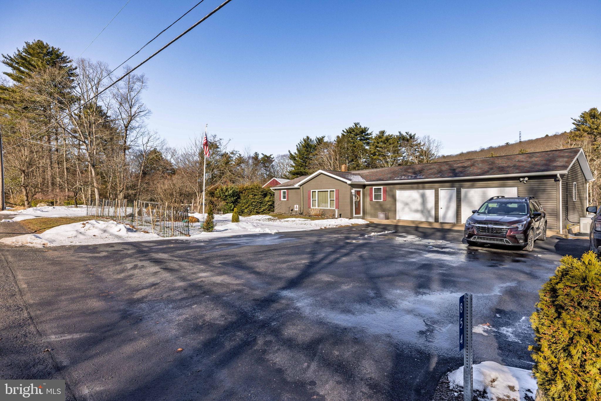 854 Lily Lake Road Wapwallopen, PA 18660 - Photo 5 of 36 Charming home nestled in a serene landscape.