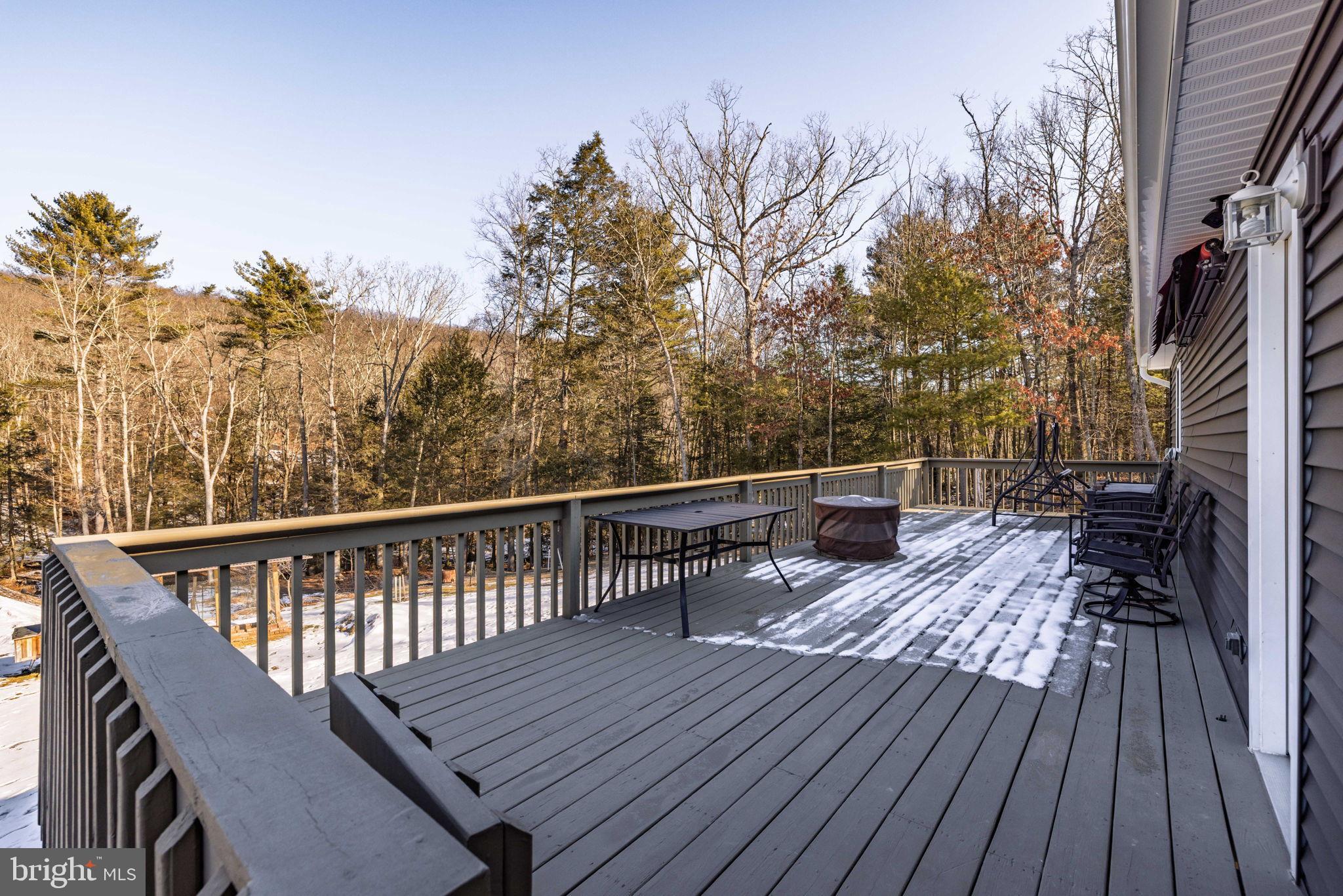854 Lily Lake Road Wapwallopen, PA 18660 - Photo 6 of 36 Serene deck overlooking tranquil woods.