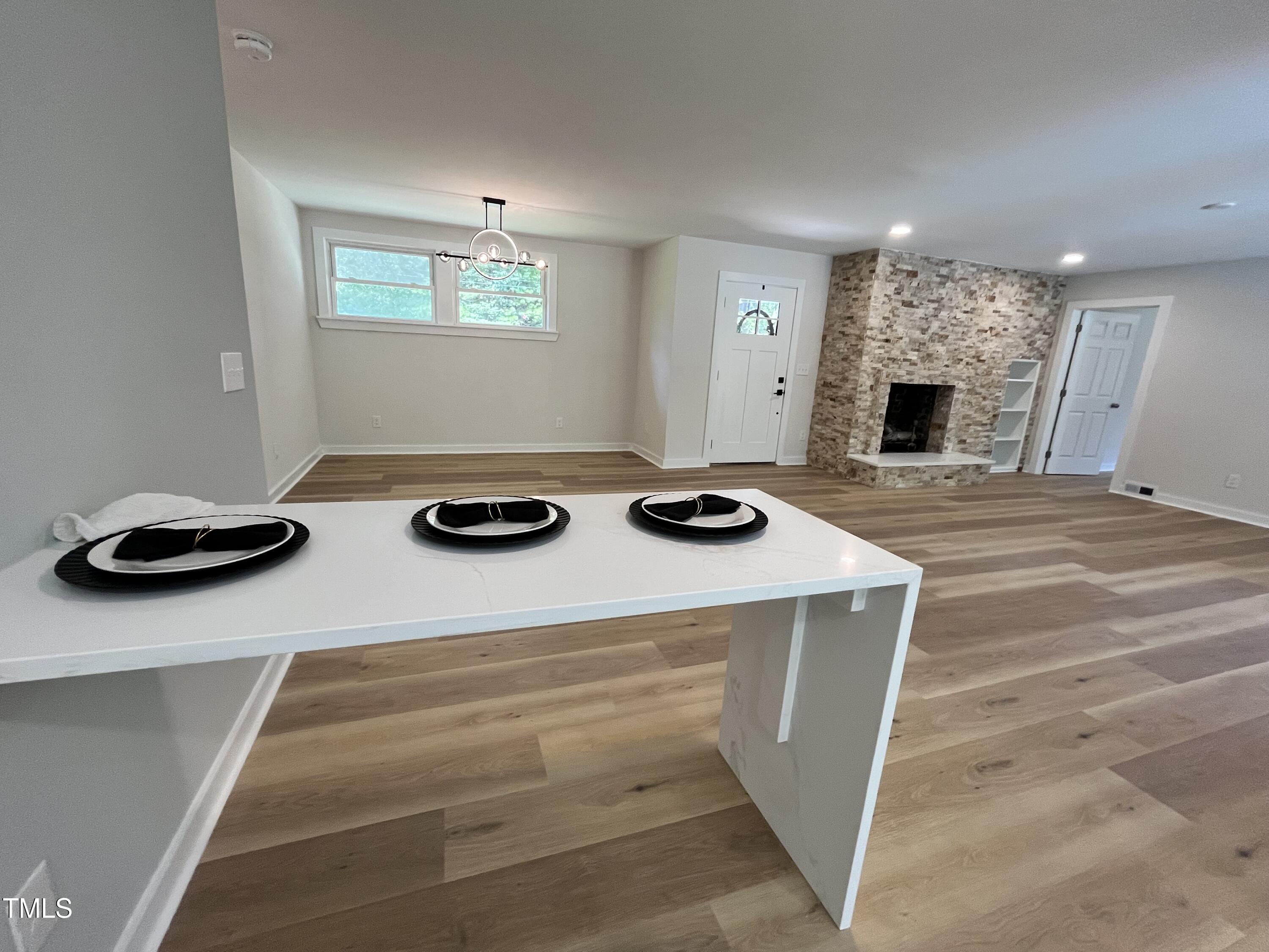 6801 Holly Springs Road Raleigh, NC 27606 - Photo 13 of 34 Waterfall breakfast nook or work space!