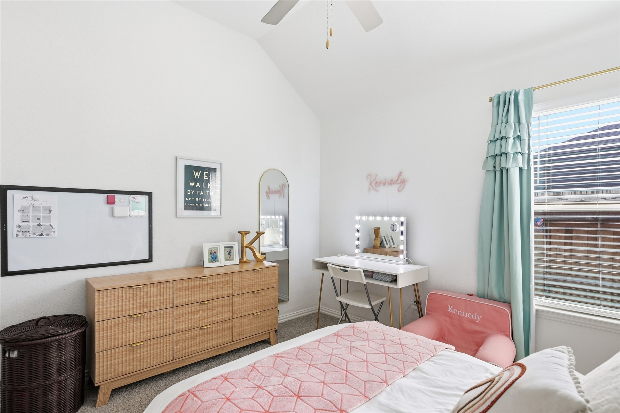 544 Cherrystone Loop Buda, TX 78610 - Photo 19 of 40 a bedroom with a bed and a dresser in it
