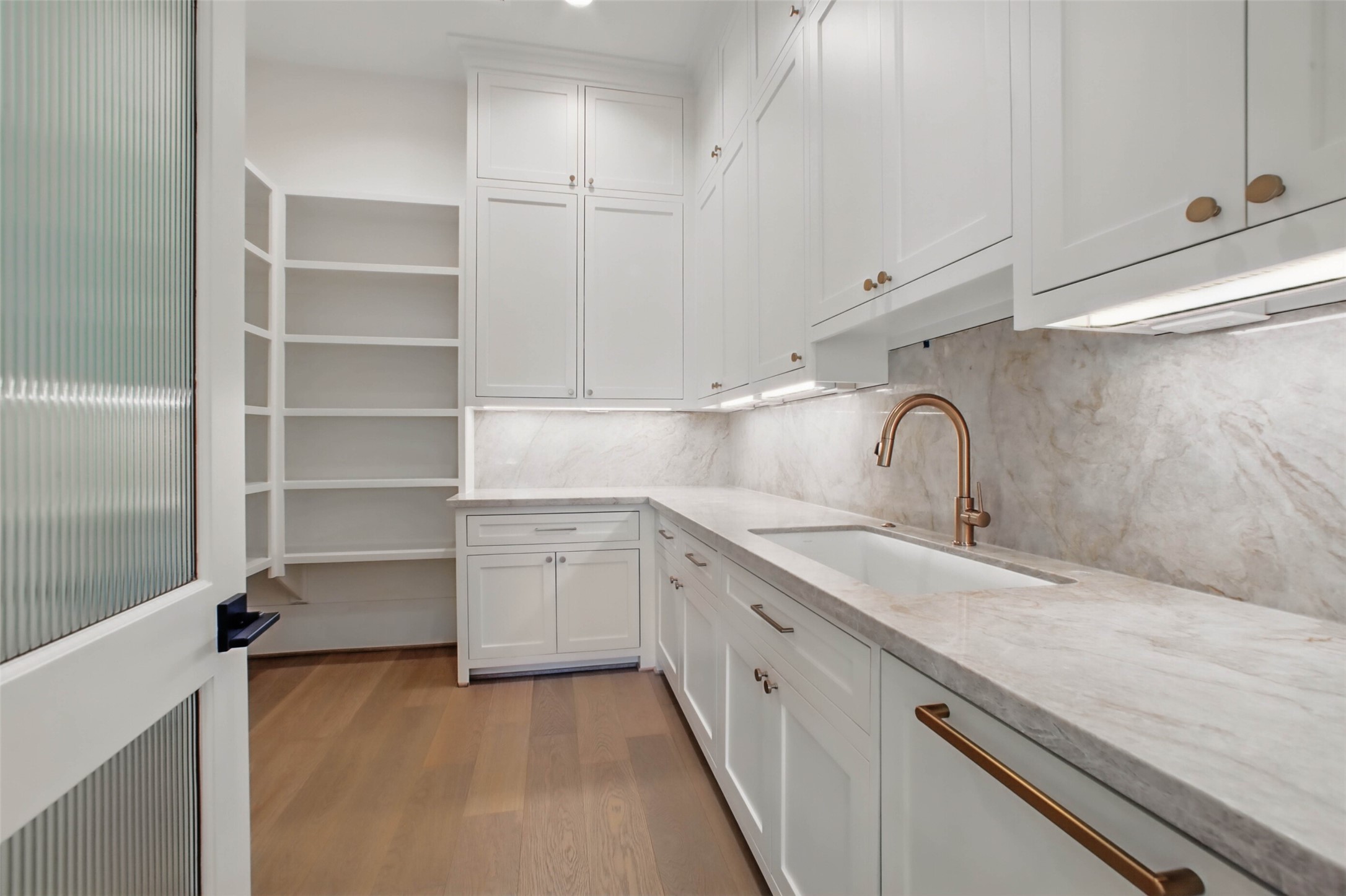 8619 Cedarbrake Drive Spring Valley Village, TX 77055 - Photo 10 of 31 a kitchen with a sink cabinets and appliances