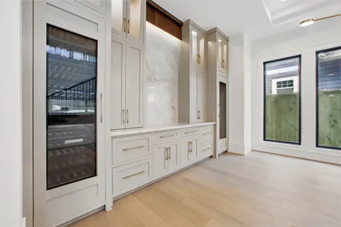 a kitchen with a sink cabinets and appliances