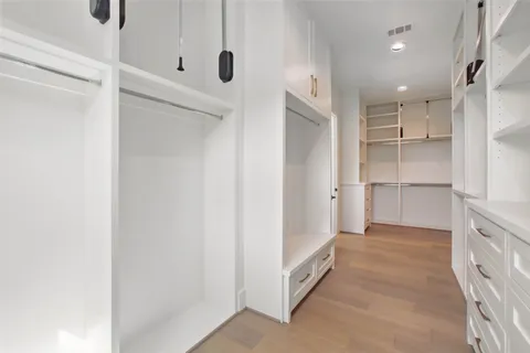 a spacious bathroom with a shower and a tub