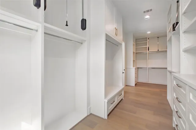 a spacious bathroom with a shower and a tub