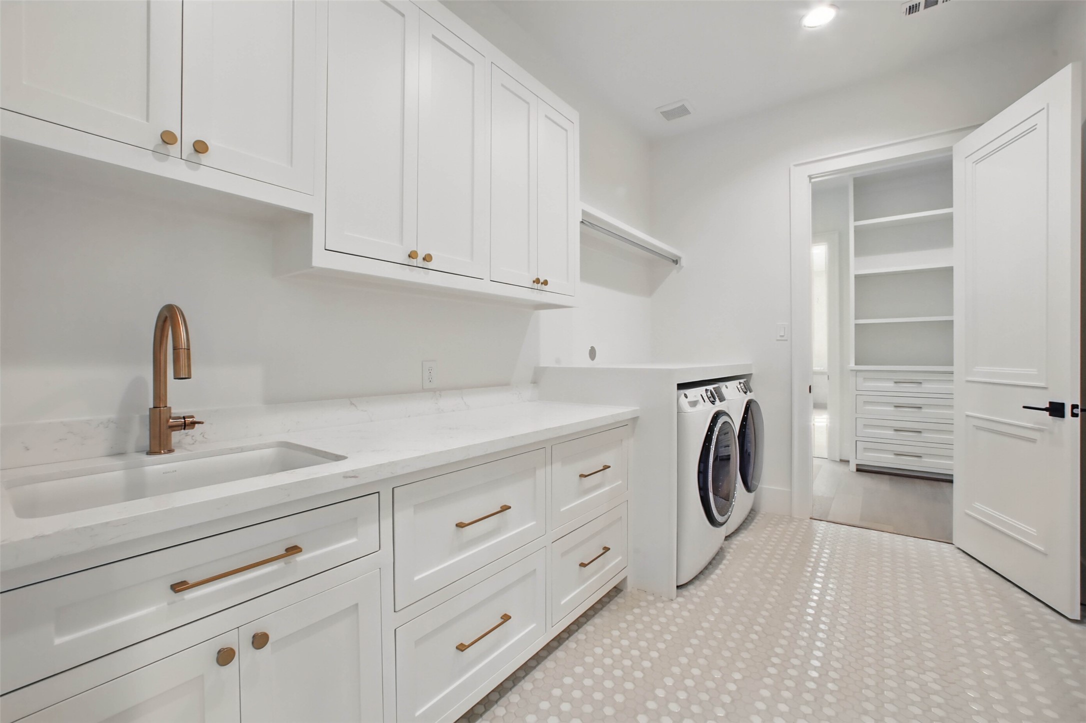 8619 Cedarbrake Drive Spring Valley Village, TX 77055 - Photo 21 of 31 a utility room with cabinets
