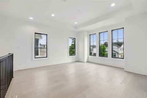 a utility room with cabinets