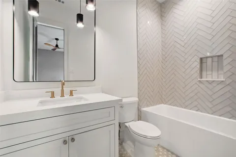 a bathroom with a shower tub double and sink