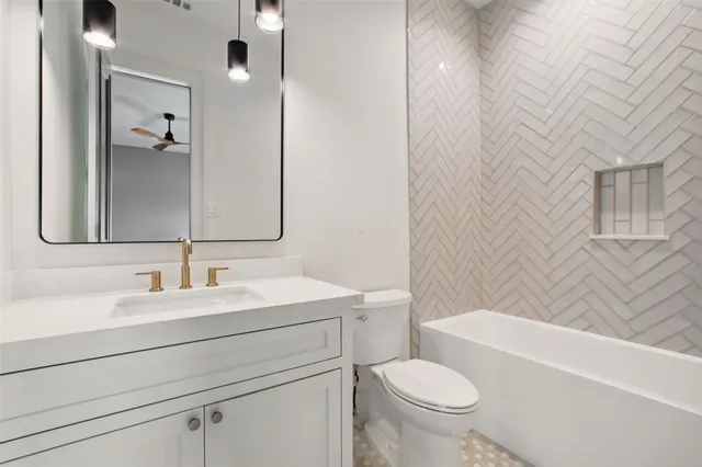 a bathroom with a shower tub double and sink