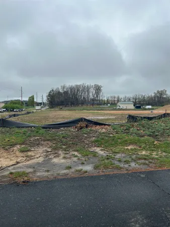 a view of a lake with a big yard
