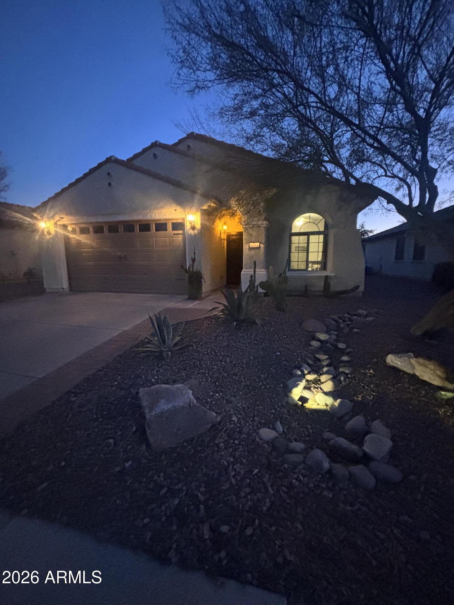 6711 West Mockingbird Way Florence, AZ 85132 - Photo 1 of 31 night house front