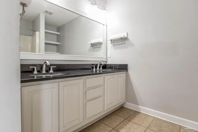 a close view of a sink and a mirror