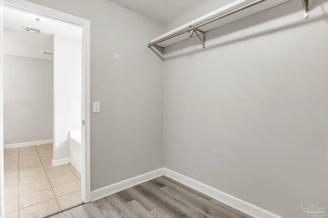 a view of a room with racks on the wall