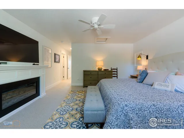 a large bathroom with a sink and a mirror