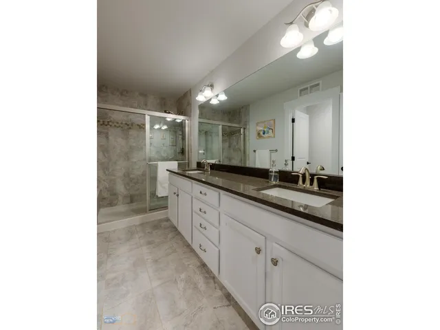 a living room with furniture and a piano