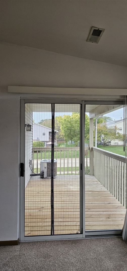 301 Village Creek Drive, Unit 2A Lake In The Hills, IL 60156 - Photo 23 of 31 a view of front door and porch
