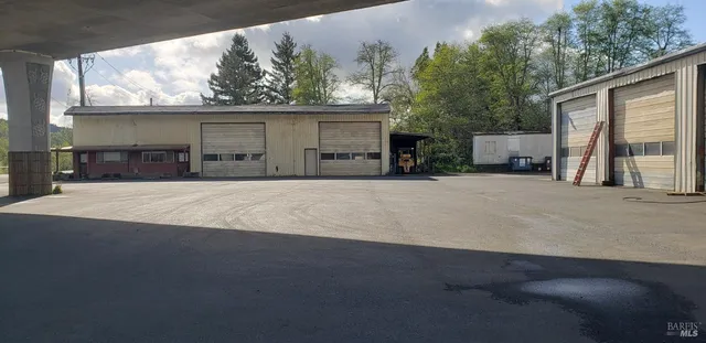 a view of a car park in front of house