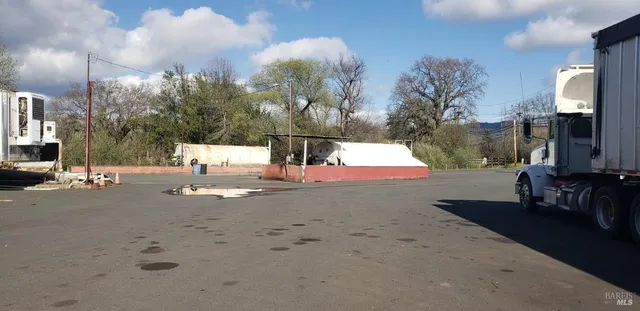 a view of a yard with patio