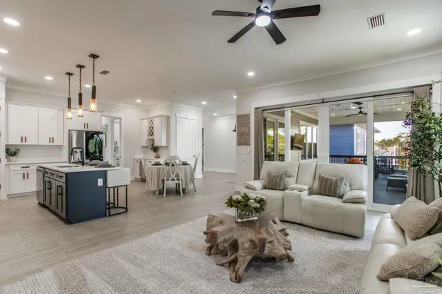 a bedroom with a large bed and a large window