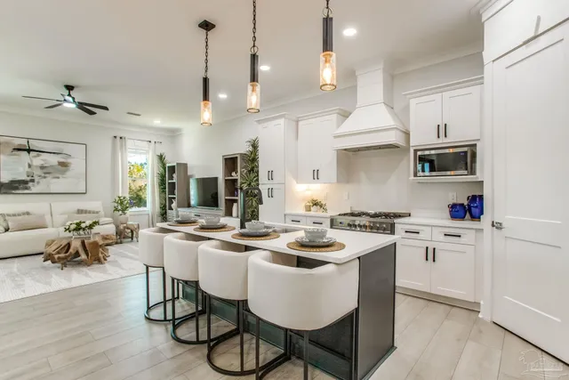 a en suite bathroom with double sink and a mirror