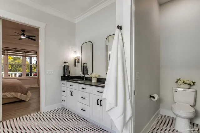 a bathroom with a sink and cabinets