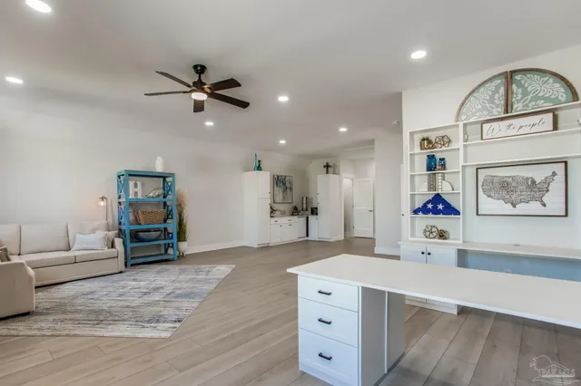 an empty room with a empty space and windows