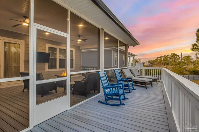 a view of roof deck with patio