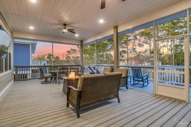 a outdoor space with furniture and wooden floor