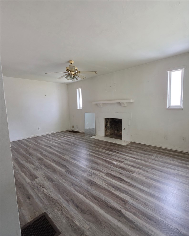 3109 Shroyer Road Kettering, OH 45429 - Photo 5 of 25 This spacious living area features wide plank flooring and a classic fireplace.