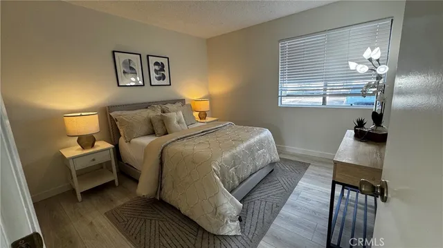 a view of balcony with chairs and potted plants
