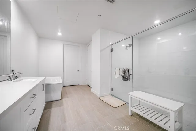 a bathroom with a toilet and a shower curtain