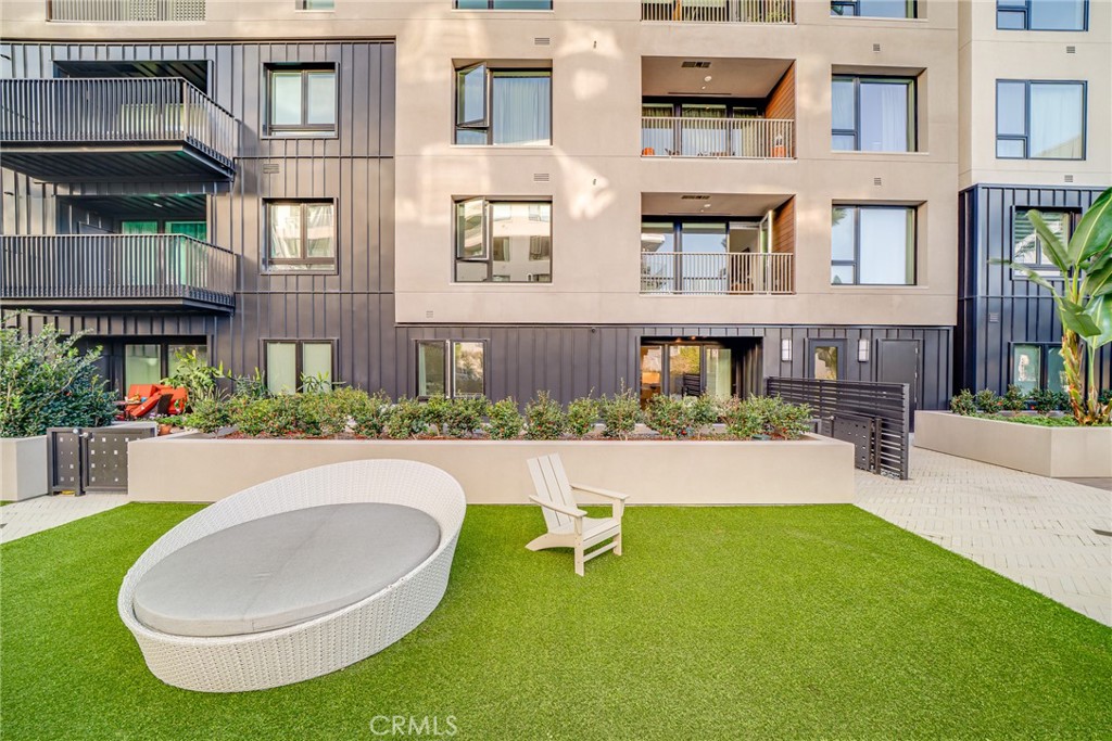 2202 Rivington Irvine, CA 92612 - Photo 19 of 21 a view of a house with a swimming pool and sitting area