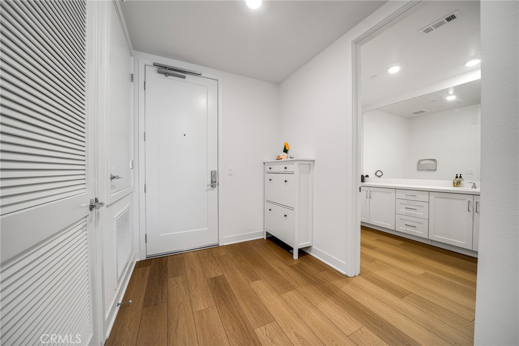 2202 Rivington Irvine, CA 92612 - Photo 3 of 21 a view of a room with wooden floor