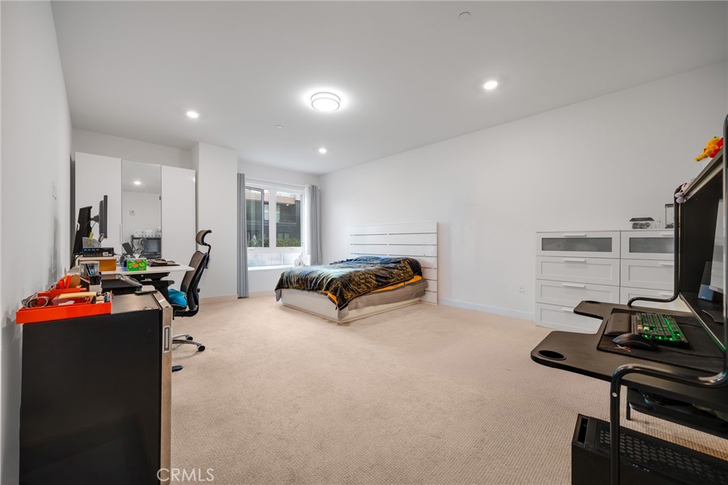 2202 Rivington Irvine, CA 92612 - Photo 10 of 21 a view of a room with furniture and gym equipment
